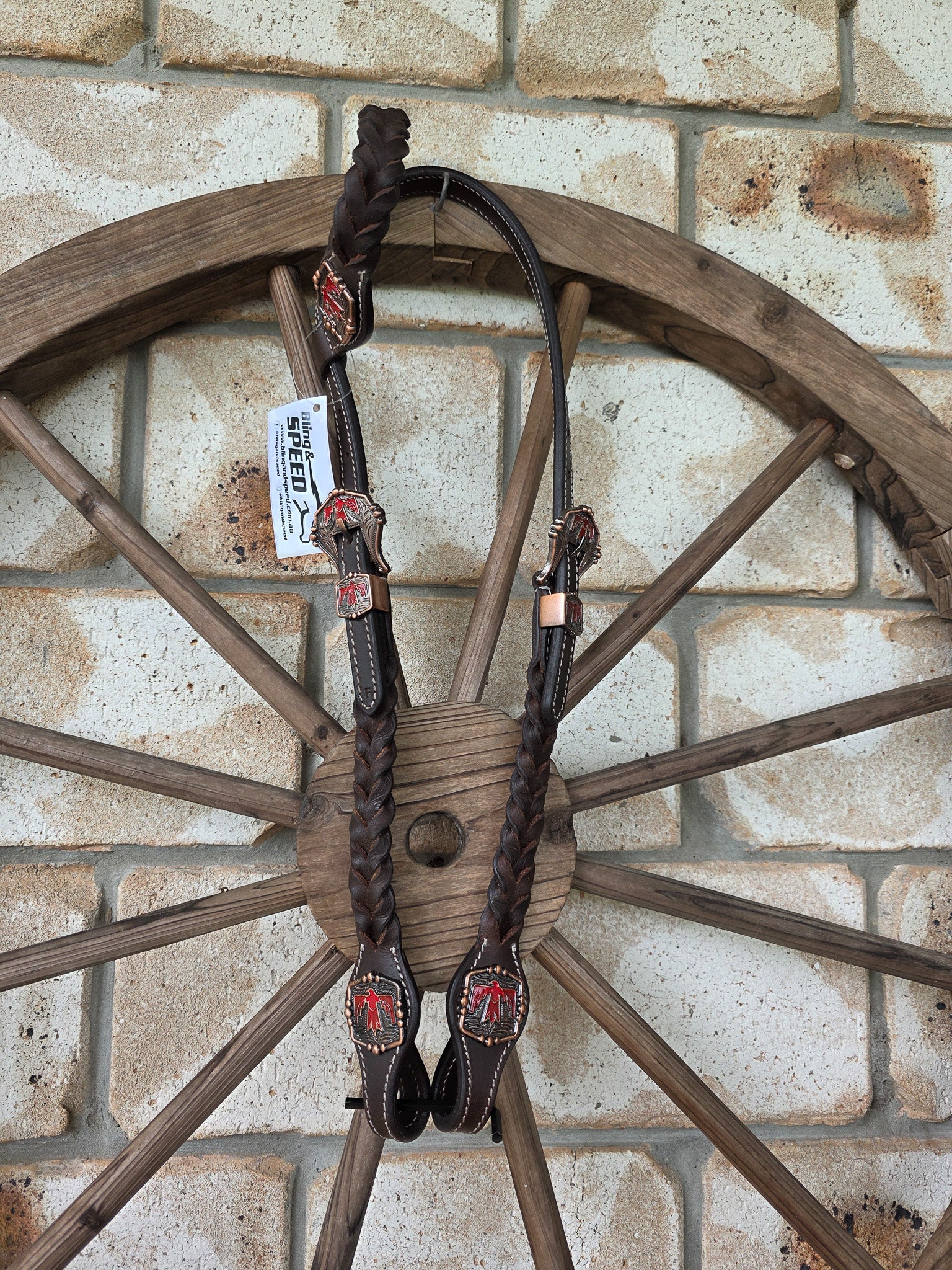 One Ear Plait Bridle with Red Thunderbird Concho