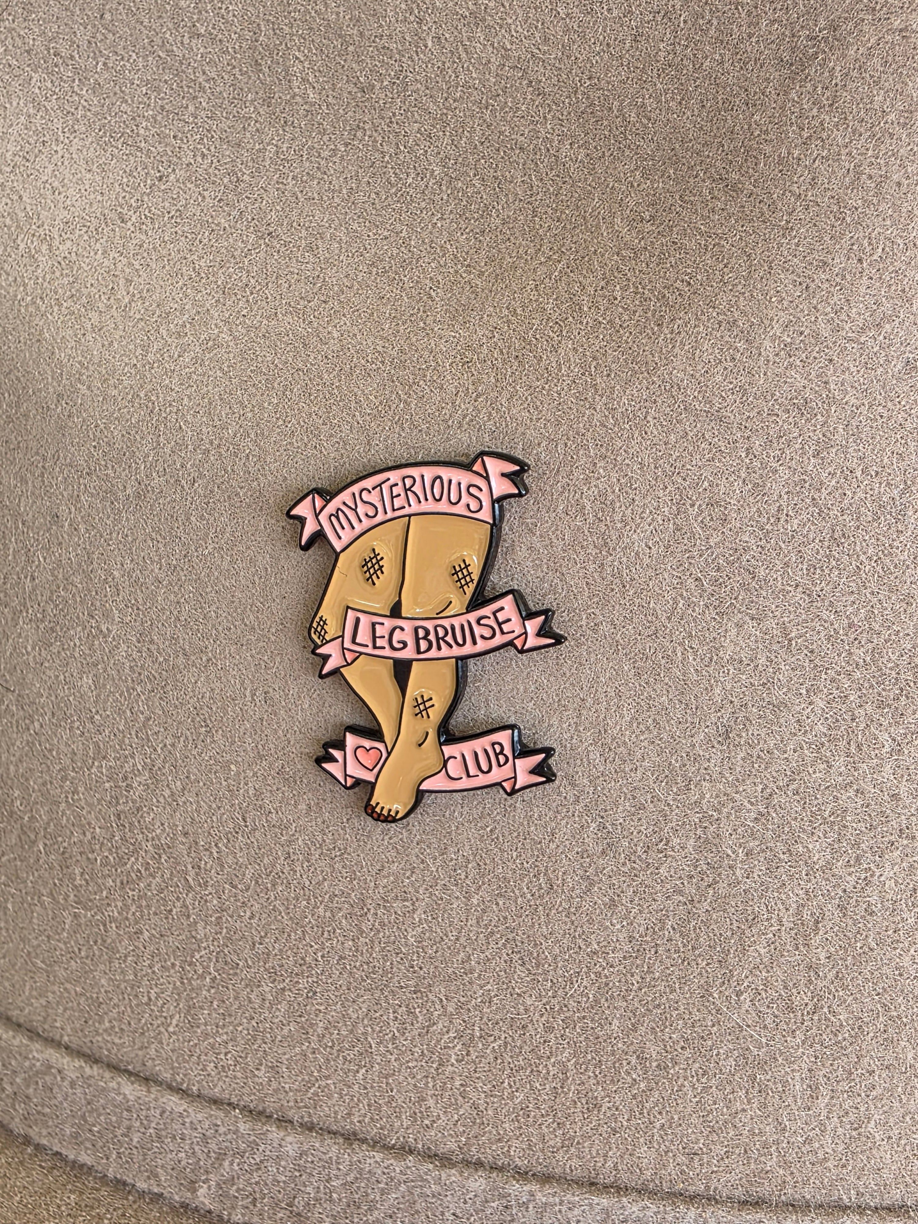 Mysterious Leg Bruise Club - Enamel Hat Pin